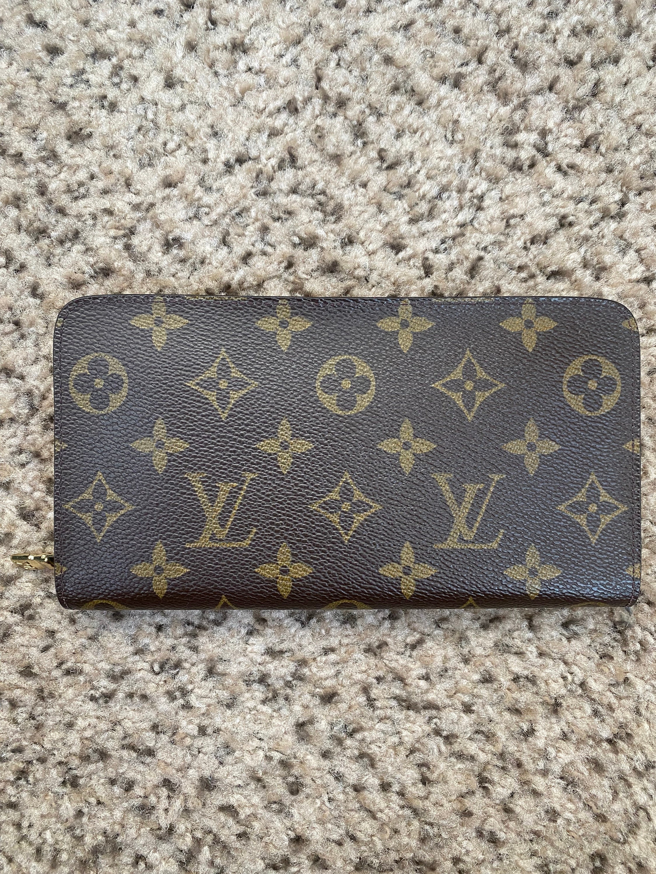 Shop Louis Vuitton Leather Long Wallet Logo Long Wallets by