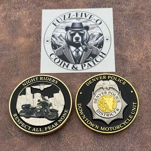 May include: Two collectible coins with a sticker. One coin features a motorcycle and the words "Night Riders, Respect All, Fear None." The other coin says "Denver Police, Downtown Motorcycle Unit." The sticker says "Fuzz-Five-O Coin & Patch."