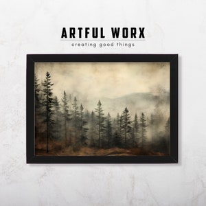 May include: A framed print of a misty forest scene with tall, dark green trees. The background is a soft, muted brown and beige with a hint of blue in the distance. The image has a vintage, faded look.