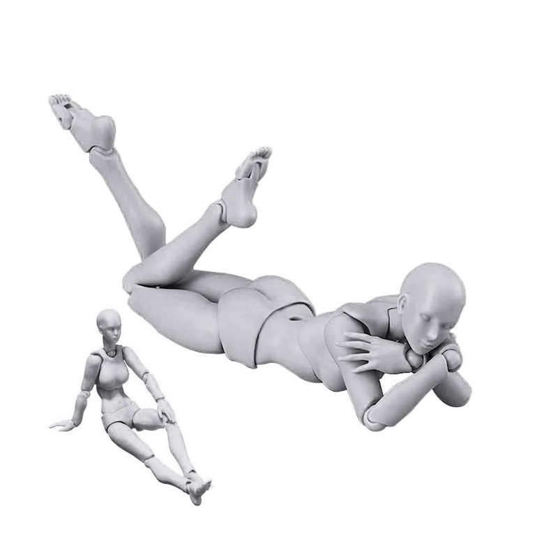 May include: Two gray articulated figures, one lying down with their head resting on their arm and the other sitting with their legs crossed. The figures are made of plastic and are used for drawing and sketching.