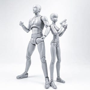 May include: Two gray articulated figures, one male and one female, standing on a white background. The male figure is posed with one arm raised and the other at his side. The female figure is holding a small gray object in her right hand.