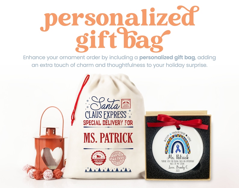 a personalized gift bag next to a candle