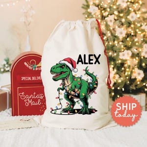 Sac de Noël dinosaure : sac père Noël personnalisé pour garçon, sac cadeau de Noël personnalisé avec nom, sac cadeau de Noël dinosaure pour garçon (CB-78)