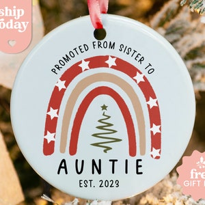 a personalized christmas ornament hanging from a christmas tree