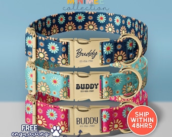 May include: Three personalized dog collars with floral patterns in blue, teal, and pink. Each collar features a gold buckle engraved with the name "Buddy" and a phone number. The collars are part of the "Minimee Collection."