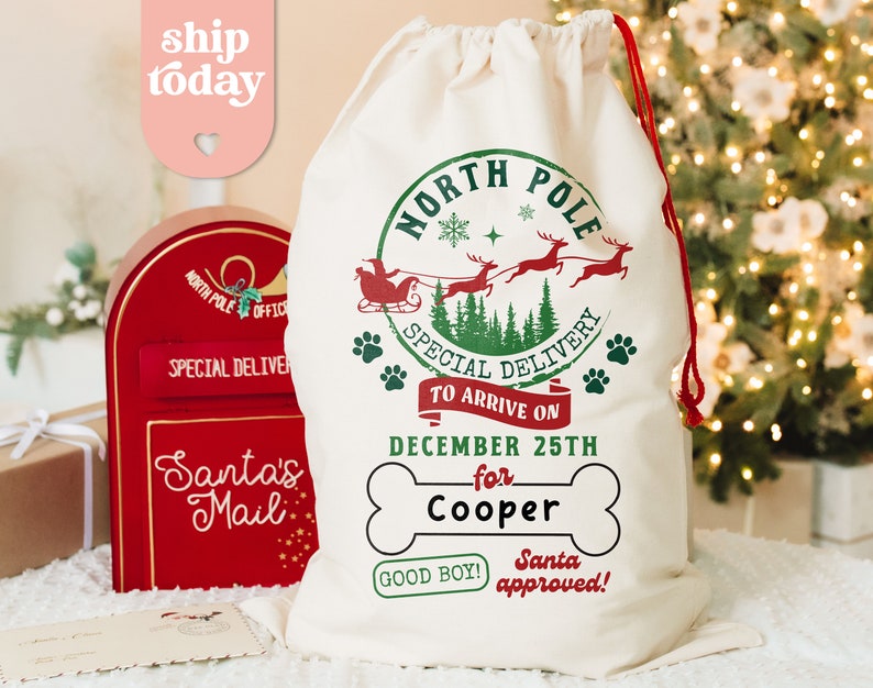 a white bag sitting on top of a table next to a christmas tree