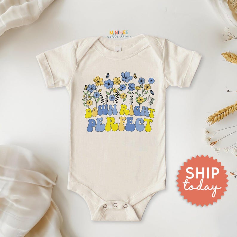 a white baby bodysuit with the words don't touch perfect on it