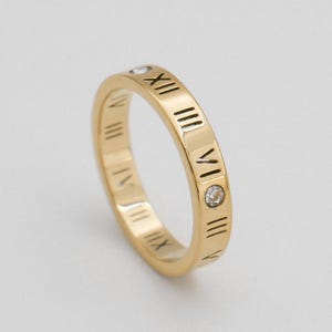 14k gold Roman numeral mossanite minimalist ring ,14k  mossanite roman rings, 14k  dainty mossanite roman rings , Roman Numeral rings .