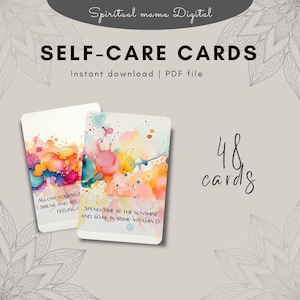 Main product image for Self-Care Cards. Text reads: 'SELF-CARE CARDS | Instant download | PDF file'. Features two cards with vibrant, watercolor abstract art and gentle reminders for self-love. A 48-card Printable Deck of Self-Care Activities for a Daily Ritual.