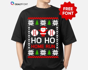 May include: Black t-shirt with a festive Christmas baseball design. The design includes snowflakes, Christmas trees, baseballs, and Santa Claus. The text "HO HO HOME RUN" is displayed in white. A red starburst graphic reads "FREE FONT".