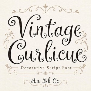 May include: A digital graphic displaying the text Vintage Curlicue in a dark brown decorative script font. Below the main title, the text reads Decorative Script Font, followed by the letters Aa Bb Cc, all framed by light brown flourishes.