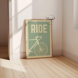 This DIGITAL DOWNLOAD bike poster features retro cycling art in soothing sage green tones, perfect wall art for cyclists, bike lovers, and vintage-inspired home decor.