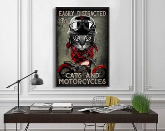 May include: A black and white illustration of a cat wearing a motorcycle helmet and goggles, riding a red motorcycle. The text "Easily Distracted By Cats And Motorcycles" is printed on the poster.