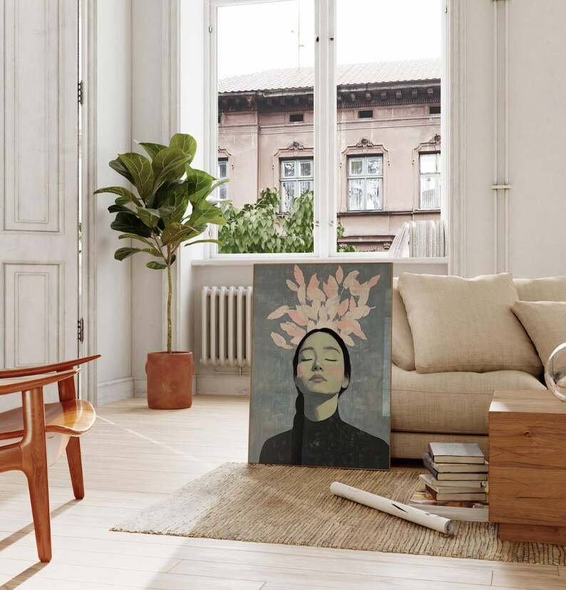 May include: A painting of a woman with pink feathers on her head, she is wearing a black turtleneck and has her eyes closed. The painting is on a canvas and is framed in a gold frame.