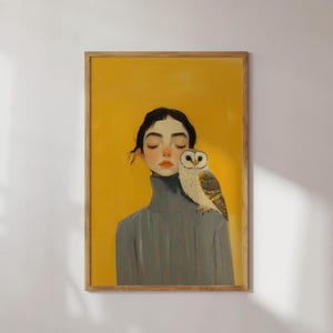 May include: A painting of a woman with her eyes closed, wearing a gray turtleneck sweater. A white and brown owl is perched on her shoulder. The background is a solid yellow color.