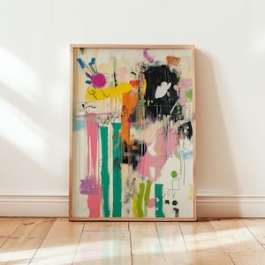 May include: Abstract painting in a wooden frame with a colourful, layered design. The painting features pink, yellow, green, blue, and black paint.