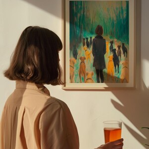 May include: A framed painting of a woman walking through a forest with a pack of dogs. The woman is wearing a dark coat and the dogs are various shades of brown and white.