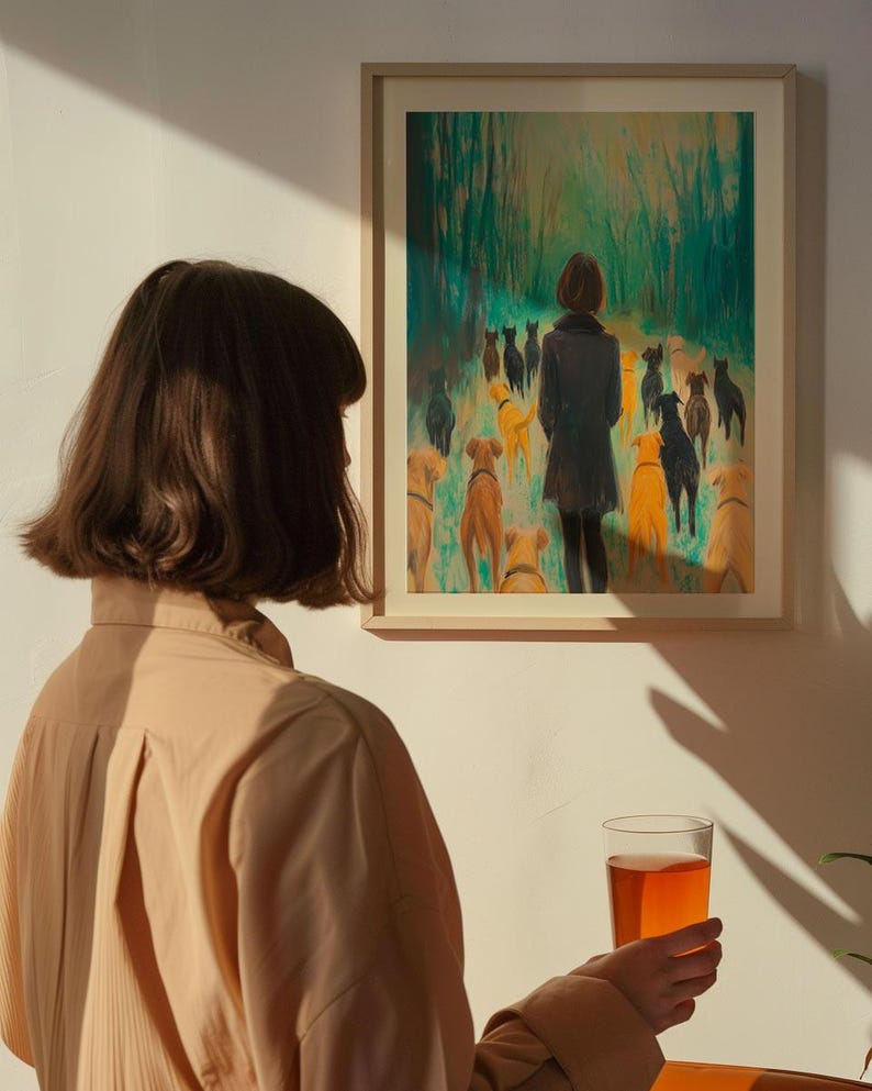 May include: A framed painting of a woman walking through a forest with a pack of dogs. The woman is wearing a dark coat and the dogs are various shades of brown and white.