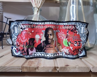 Metal banknote featuring Chicago Bulls basketball star sculpture, street art, pop art decoration, and painting.