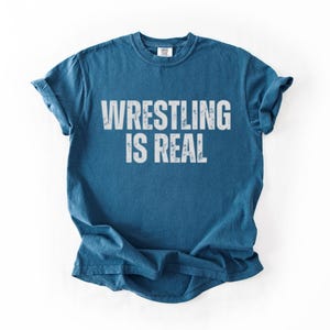 平本蓮着用 travis WRESTLING IS REAL Tシャツ - メルカリ