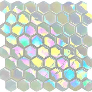 May include: A sheet of iridescent white hexagonal mosaic tiles. The tiles have a subtle, shimmering effect.