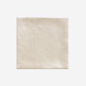 May include: A square, off-white tile with a textured surface. The tile has a slightly uneven appearance, suggesting a handmade or natural aesthetic. The color is a warm, neutral tone, suitable for various design applications.