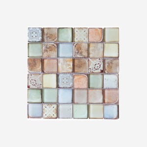 May include: A mosaic tile pattern featuring a grid of small, square tiles. The tiles have a variety of colors, including beige, light blue, green, and orange. Some tiles have a distressed, aged appearance, while others feature decorative patterns.