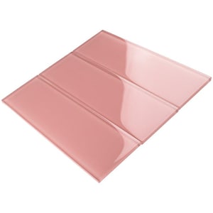 May include: Three rectangular pink glass tiles arranged horizontally. The tiles are glossy and have a smooth surface.