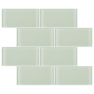 May include: A set of six light green glass subway tiles. The tiles are arranged in a brick pattern.