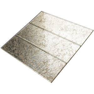 May include: A sheet of metallic gold mosaic tiles with a crackled finish. The tiles are arranged in a staggered pattern.