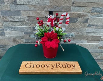 Frosty, Red Christmas Bucket, Artificial Flowers Tribute Funeral Lasting Memorial Artificial Floral Tributes Keepsake Seasonal Xmas