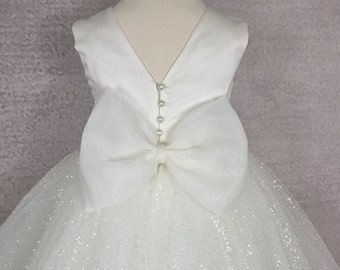 Flower girl dress.  Glitter tulle flower girl dress with bow. Ivory  baby dress. Knee or Tea dress. Wedding dress.