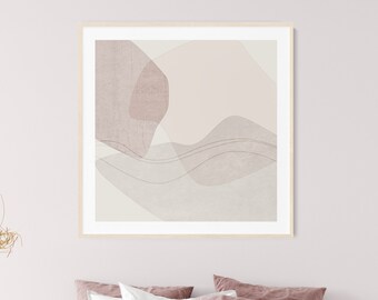 May include: A white bed with a pink blanket and pillows. A framed abstract print with pink and white shapes hangs on the wall behind the bed.