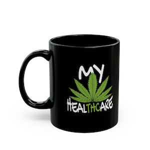 Pot Leaf Coffee Cup - Elevated Essence: Black Ceramic 11oz Coffee Mug - Marijuana Plant in Artistic Splendor - "My Healthcare"