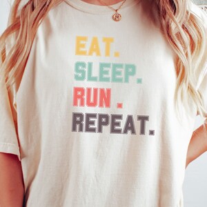 Running Shirt | Running Gifts | Gym Shirts | Runner Shirt | Runner Gifts | Eat Sleep Run Repeat T-Shirt | Workout Shirt | Track and Field