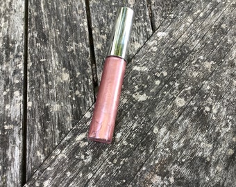 Rose gold tinted lip gloss long lasting strawberry vanilla smell and theme 10ml