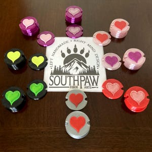 Removeable Heart Pom-Pom Keeper Buttons for Beanies. Washable Heart Buttons by Southpaw Fiber Arts.