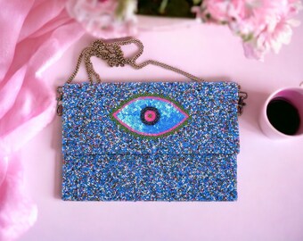 Blue beaded purse with eye