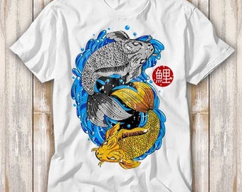 May include: White t-shirt with a graphic of two koi fish swimming in blue water. The fish are black and white and gold, and the design includes the Japanese word "魚" (fish) in red.
