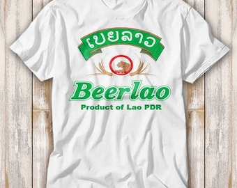 May include: White t-shirt with a green and white logo that says "Beerlao" and "Product of Lao PDR". The logo also features a tiger in a circle.