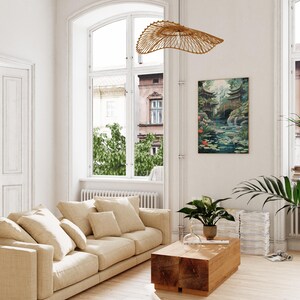 A modern living room with a large window overlooking a garden, a beige sofa, a wooden coffee table, and a hanging woven light fixture.