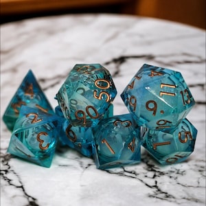 Treasures Deep Liquid core dice set Sea Green sharp resin DnD roleplay D20 glitter filled gold numbering