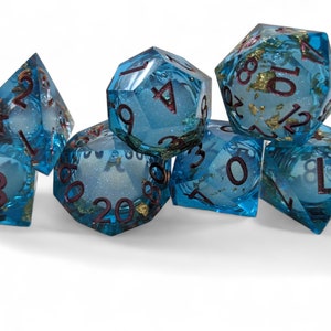 Oceans Treasure Liquid core dice set blue resin  magenta numbering sharp resin DnD roleplay D20 gold flake glitter filled