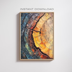 May include: Abstract painting of a tree trunk cross-section with colorful rings and cracks. The colors are mostly yellow, orange, red, blue, and brown.