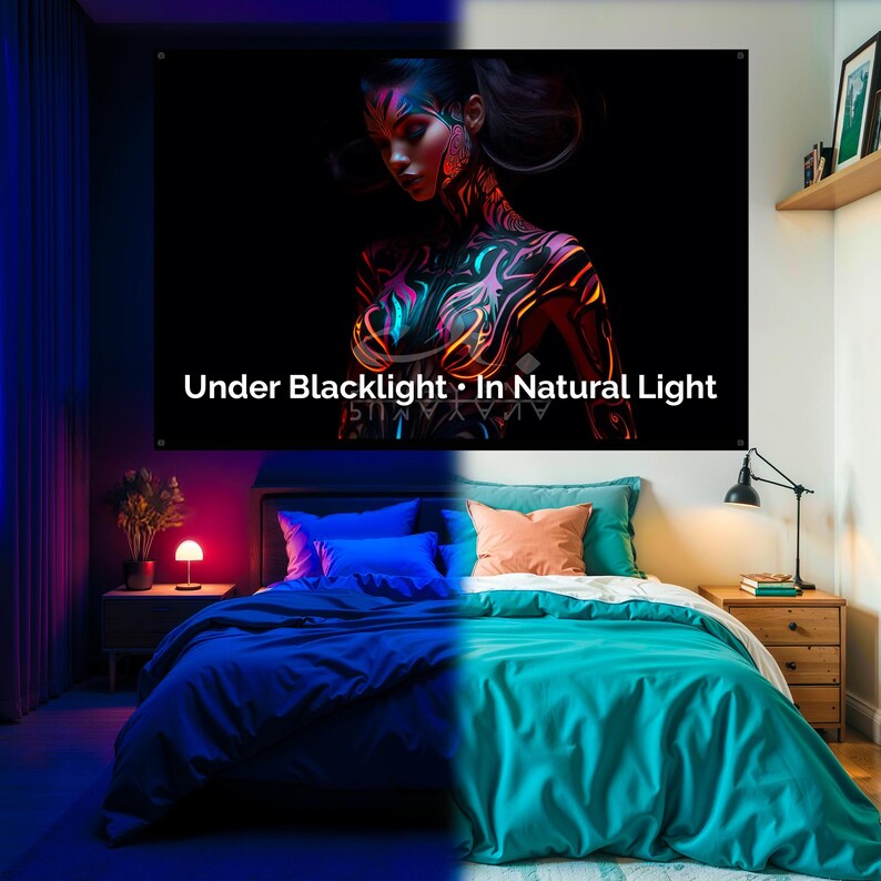May include: A large black wall tapestry with the text "Under Blacklight &bull; In Natural Light" features a woman with neon body art. The image is split, with the left side illuminated by blacklight and the right side in natural light. A bed with blue and teal bedding is in the foreground.