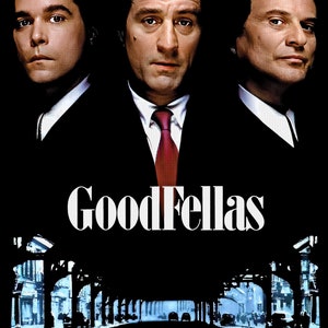 May include: A movie poster for the film "Goodfellas" featuring three men in suits. The men are looking directly at the viewer. The poster has a dark background with the title of the film in white letters.