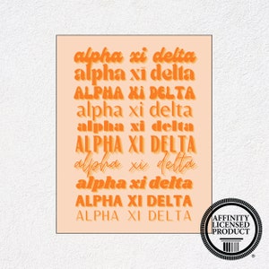 May include: A rectangular print on a light peach background featuring the text Alpha Xi Delta repeated in ten different orange font styles, ranging from bold block letters to cursive scripts, with a circular Affinity Licensed Product seal.