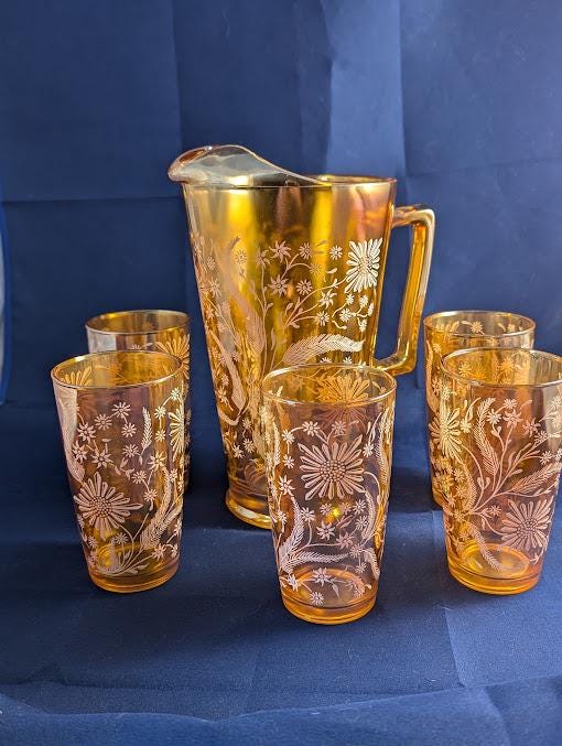 Jeannette marigold iridescent carnival glass pitcher with five glasses