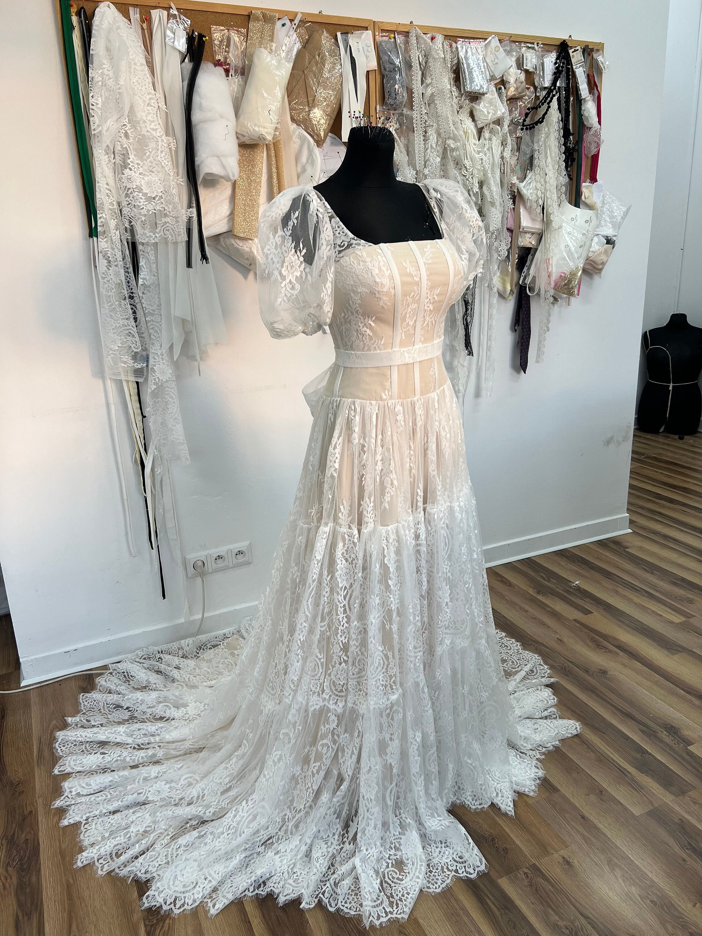 Vintage Off-the-Shoulder Lace Wedding Gown with Puff Sleeves DP7862