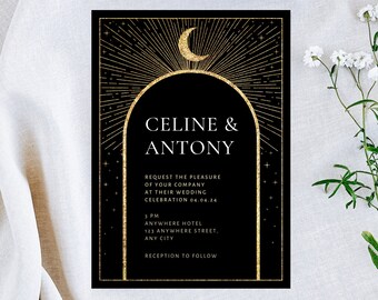 May include: Black wedding invitation with gold foil accents. The invitation features a crescent moon and stars with a gold archway. The text reads "CELINE & ANTONY" and includes the wedding date, time, and location.